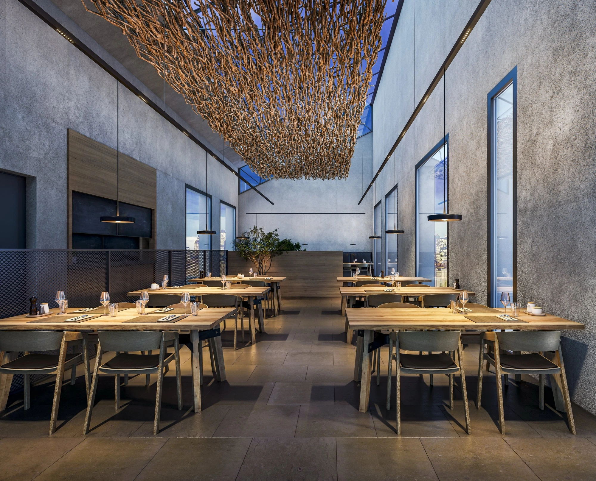 Schwarze Ribag Pendelleuchten Arva über Holztischen in einem hohen Restaurantraum